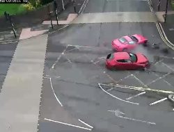 Moment Britain’s only pink £120,000 Ferrari is sent flying after being hit by car at junction